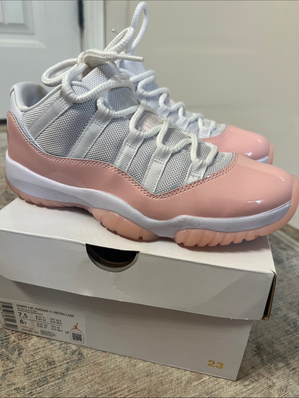 Womens air Jordan 11 Retro Low. White/Legend pink. Size: Womens 7.5